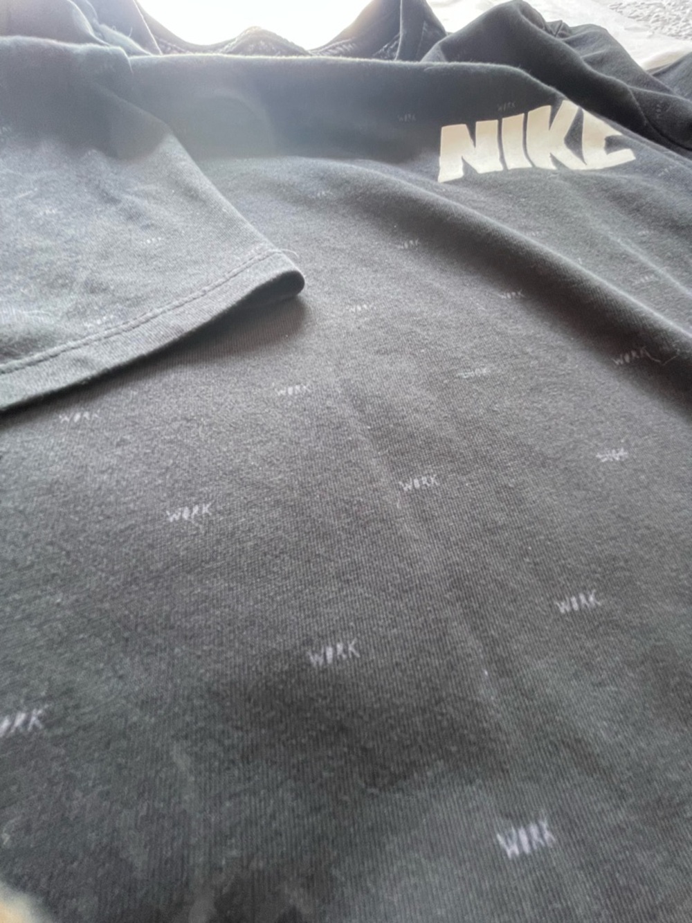 Men’s Medium Nike Black Logo Tee with Subtle All-Over Script Work